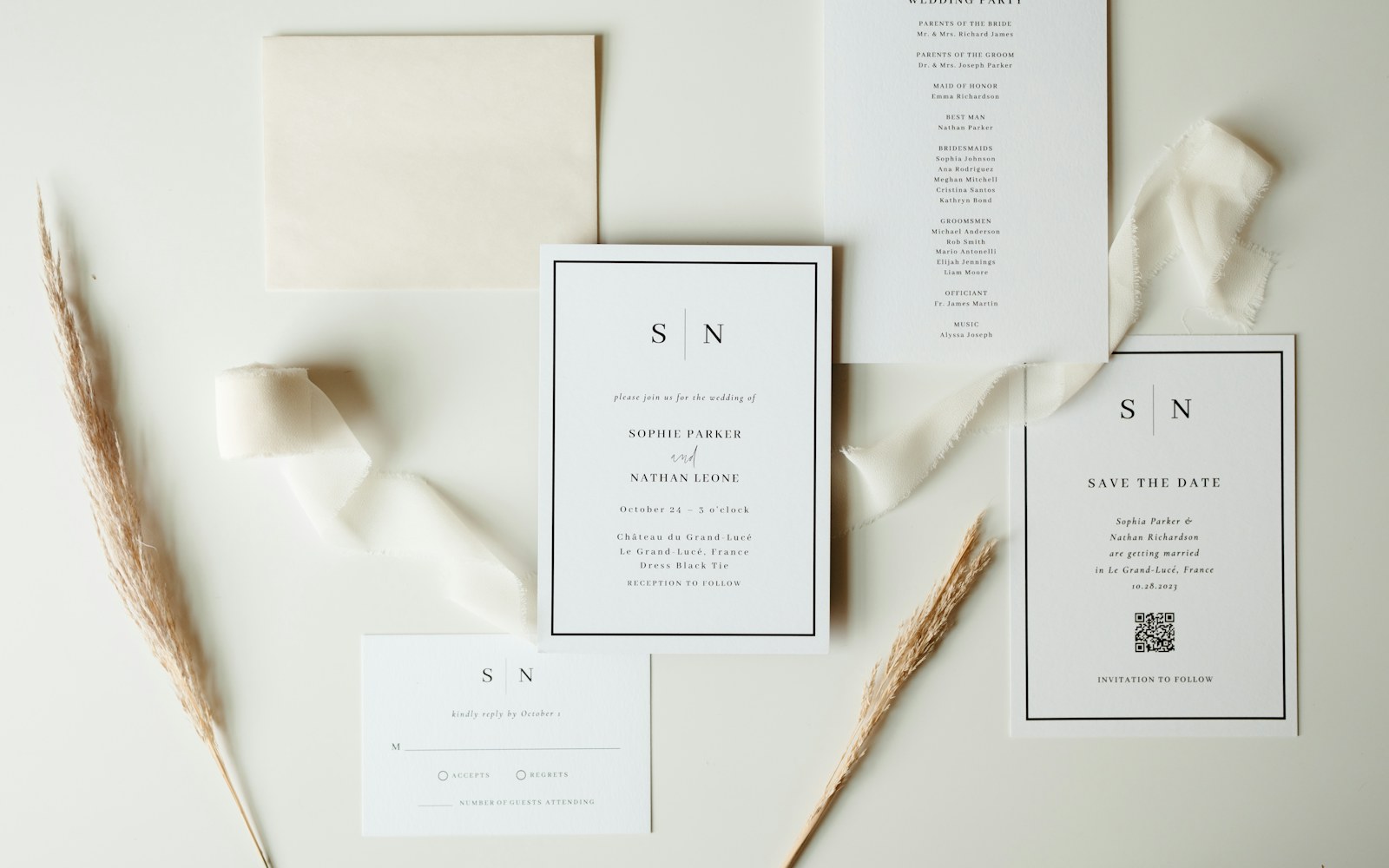 Wedding stationery suite with neutral ribbon and dried flowers